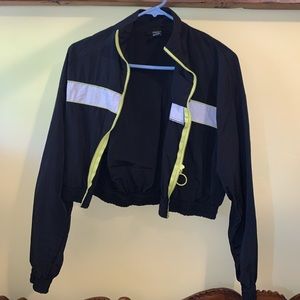 Black reflective windbreaker
